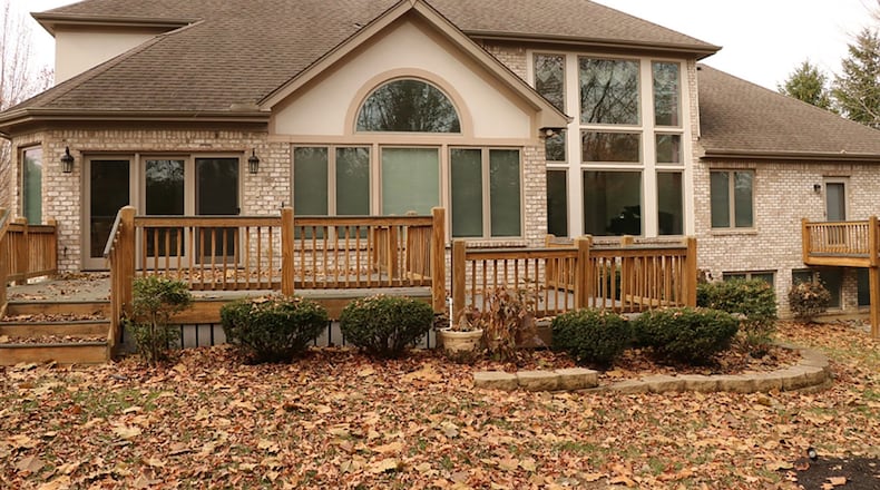 The brick 2-story has about 6,680 sq. ft. of living space on 3 levels. The finished lower level includes an open recreation room and media room.