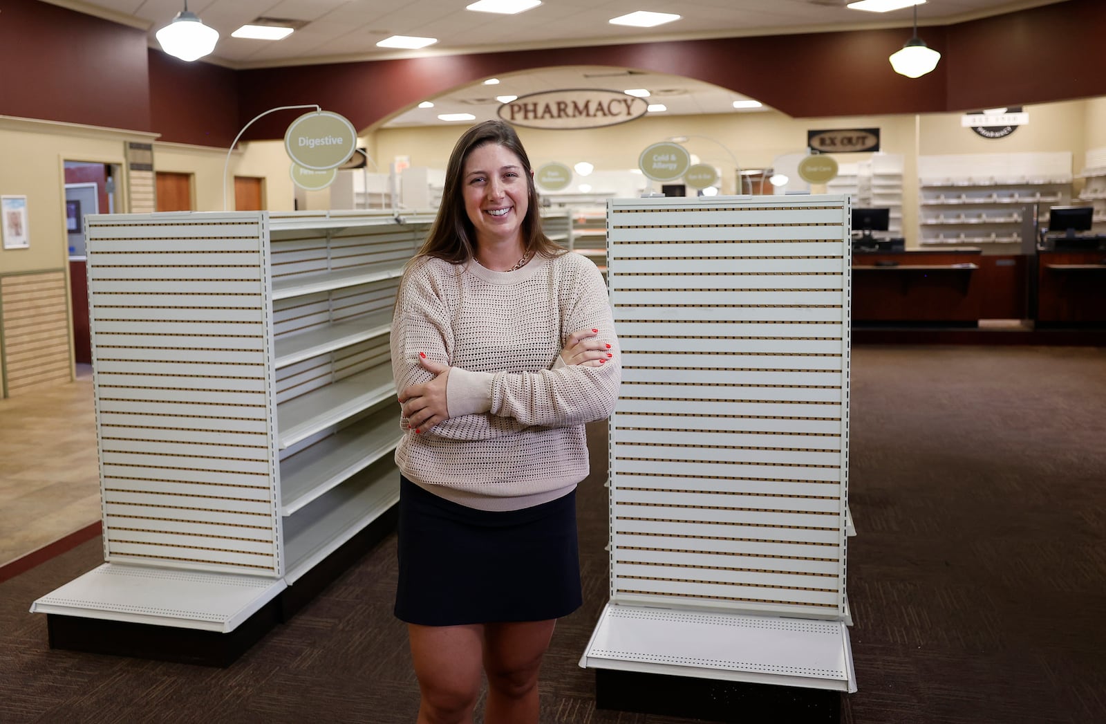 RxAvenue owner Megan Miller poses for a portrait inside her store on Tuesday, August 5, 2025, in Springfield. JOSEPH COOKE/STAFF
