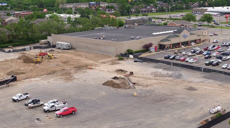 Preparation for construction of a new Kroger is underway in Moraine next to the existing grocery story. Demolition of the old Alex Bell Plaza opened up space for the new store. TY GREENLEES / STAFF