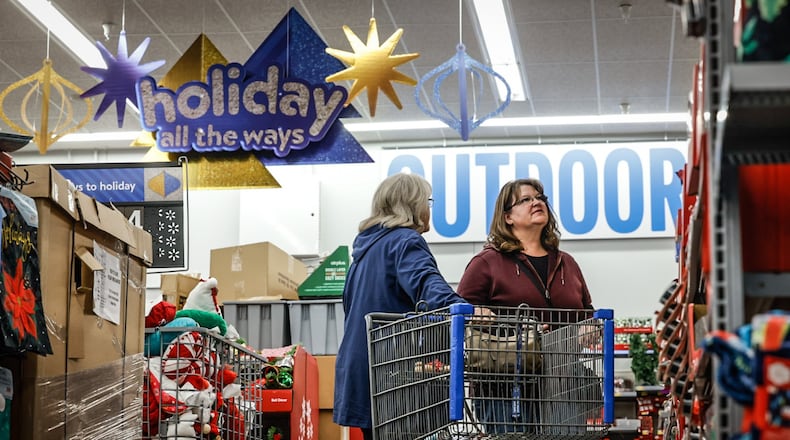 Sherry Gregory, left and Kari Knight shop together at the Beavercreek Walmart Monday November 14, 2022. JIM NOELKER/STAFF