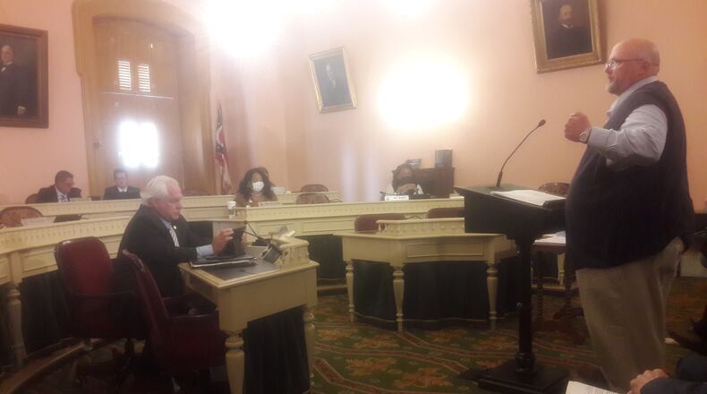Rob Sexton, legislative affairs director for the Buckeye Firearms Association, speaks in favor of "permitless carry" of concealed weapons to an Ohio House committee on Oct. 14, 2021