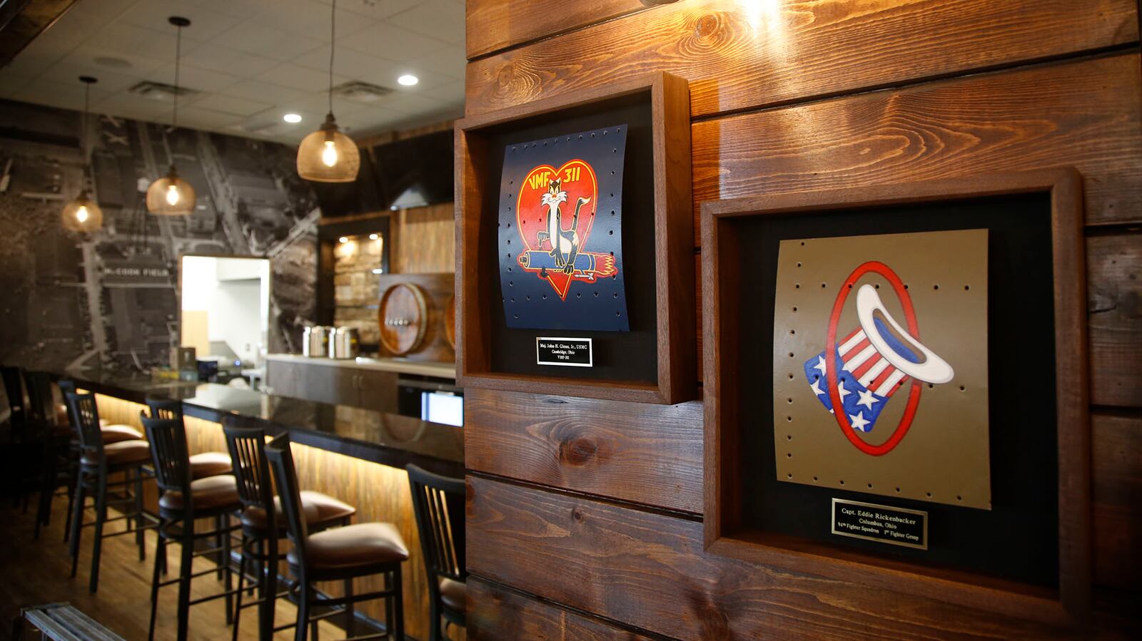 Aircraft nose are reproductions by Ron Kaplan at the new Flyboys Deli in Beaverceek.  TY GREENLEES / STAFF