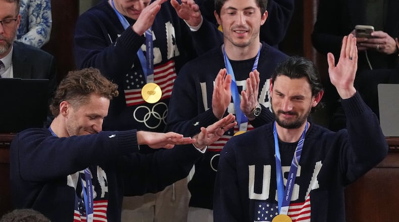 Members of the United States' hockey team attend as President Donald Trump delivers the State of the Union address to a joint session of Congress in the House chamber at the U.S. Capitol in Washington, Tuesday, Feb. 24, 2026. (AP Photo/Matt Rourke)