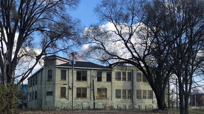 The new owner of 141 Ringgold St. in Dayton plans to renovate the building into a wedding and business event center. CORNELIUS FROLIK / STAFF