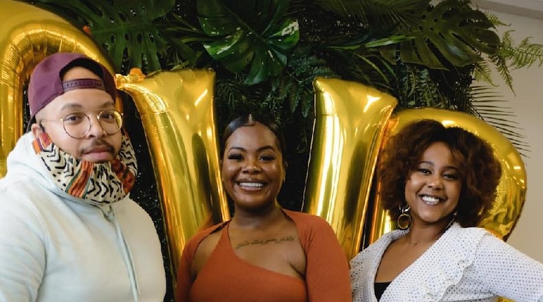 Scripted in Black is a multidisciplinary arts collective that collaborates with local businesses to create high scale experiential installments. The team consists of Korey Smith (left), visuals and marketing director, Dana Graham (center), founder and creative director and Ashley Brooks (right), installment coordinator.