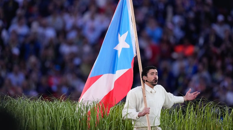 Bad Bunny performs during halftime of the NFL Super Bowl 60 football game between the New England Patriots and the Seattle Seahawks, Sunday, Feb. 8, 2026, in Santa Clara, Calif. (AP Photo/Mark J. Terrill)