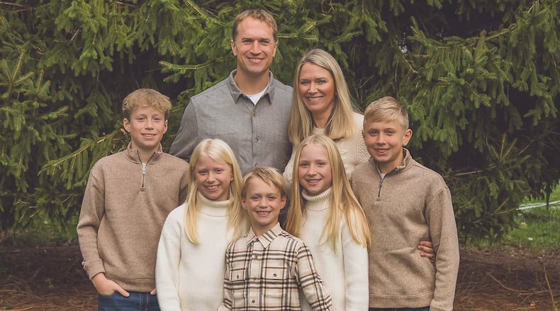 Pastor Casey Cramer and his family: L-R Caleb (13), Katherine (8), Callum (6), Karis (10), Christopher (12). Wife Kelsey to the right of Cramer.