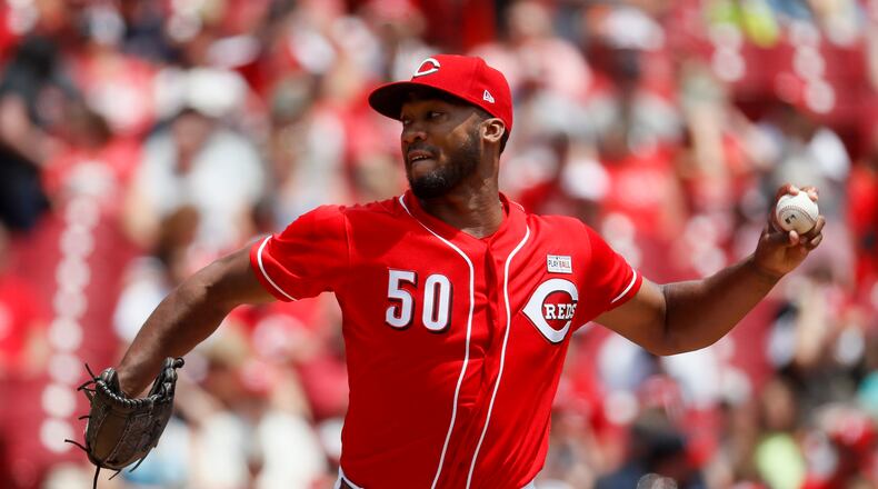 Cincinnati Reds starting pitcher Amir Garrett throws in the first inning of a baseball game against the Atlanta Braves, Sunday, June 4, 2017, in Cincinnati. (AP Photo/John Minchillo)