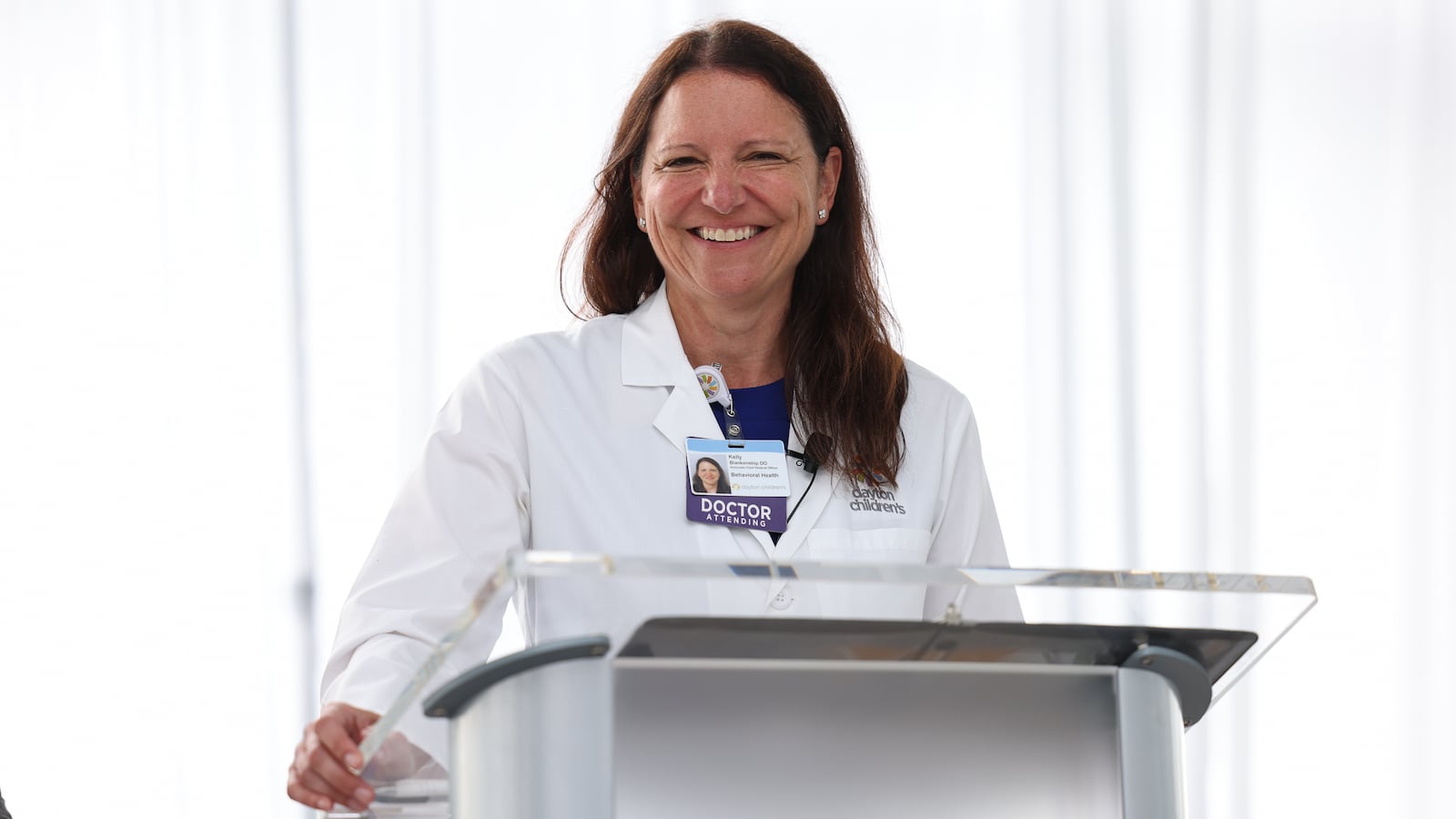 Kelly Blankenship, associate chief medical officer at Dayton Children's, speaking during a ceremony to open the Mathile Center for Mental Health and Wellness, which will begin serving patients next month. BRYANT BILLING / STAFF