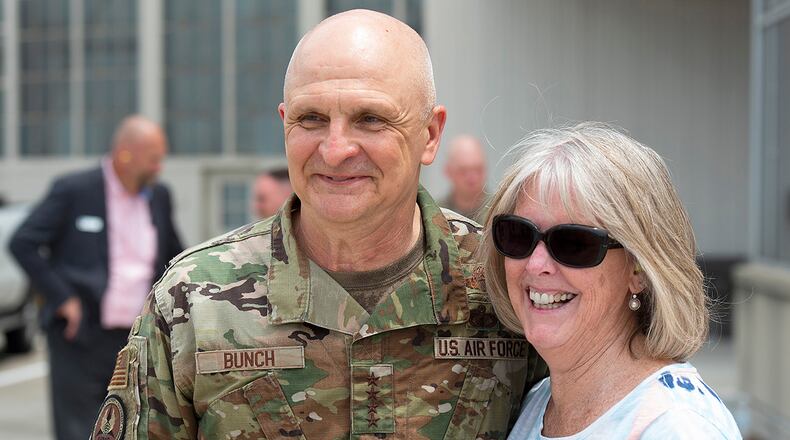 Gen. Arnold W. Bunch Jr., Air Force Materiel Command commander, and his spouse, Caroline Bunch, pose for a photo following his Fini Flight on June 8. The Bunch leadership team will transition into retirement on Aug. 1, following 38 years of Air Force service. U.S. AIR FORCE PHOTO/R.J. ORIEZ