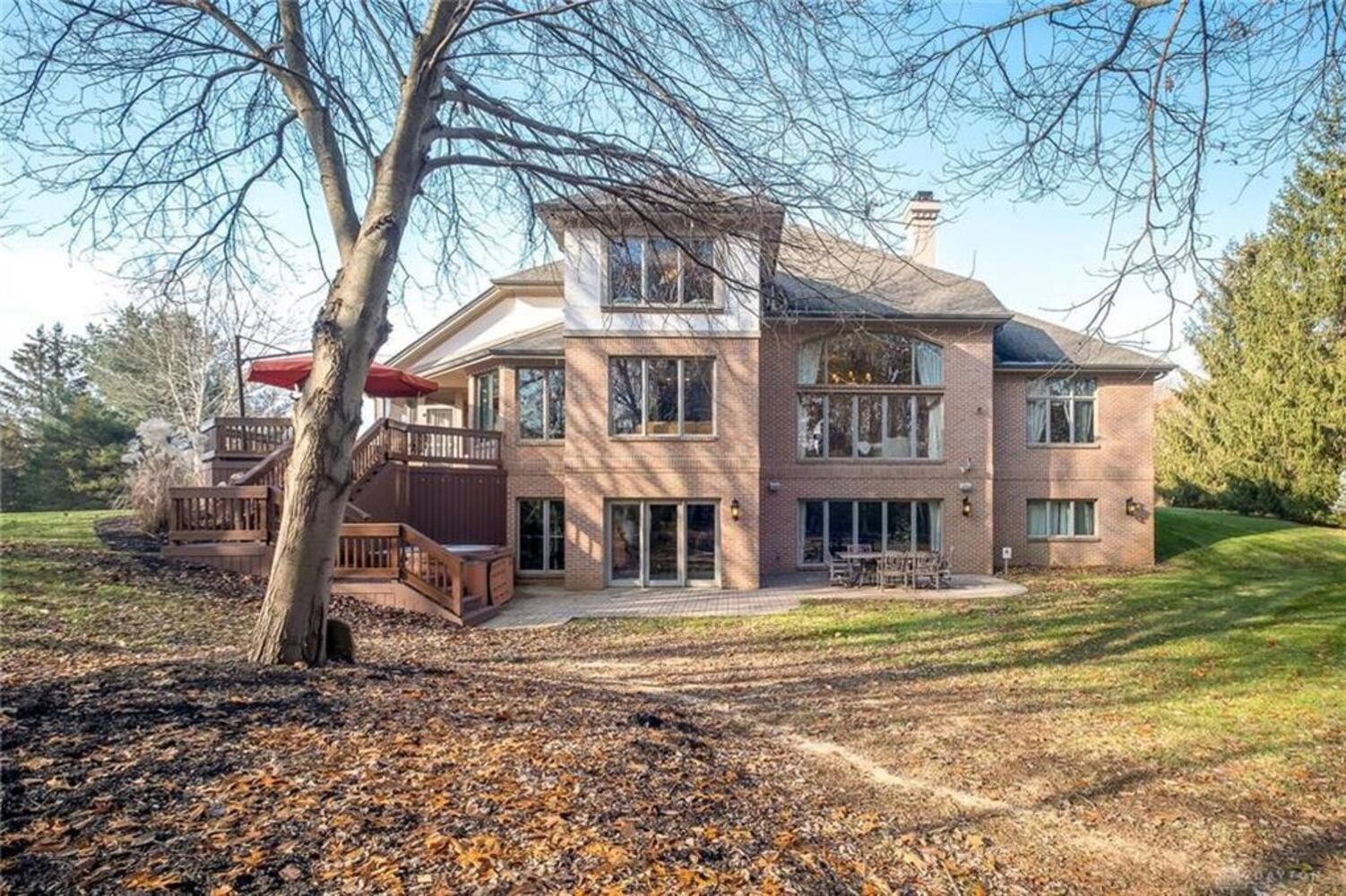 French country-style home offers grand social areas