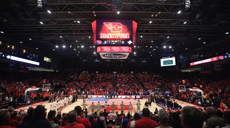 Fans stand for the national anthem before a game between Dayton and Indiana State on Saturday, Nov. 9, 2019, at UD Arena. David Jablonski/Staff