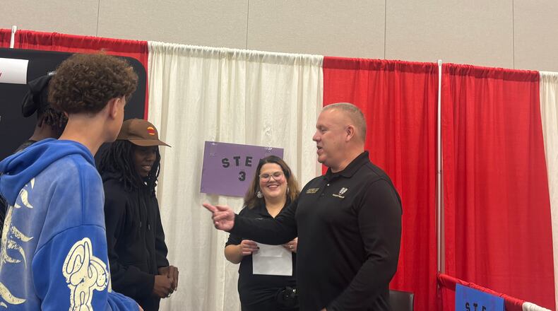 Employees from the Montgomery County Probatation Office speak to students during a career fair Wednesday, Oct. 8. Eileen McClory/ staff