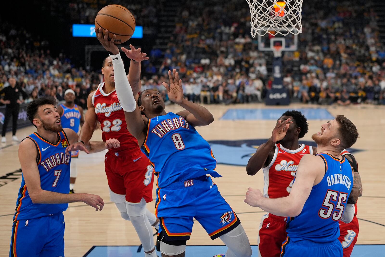 Oklahoma City Thunder forward Jalen Williams (8) shoots the ball past Memphis Grizzlies guard Desmond Bane (22) during the first half in Game 4 of an NBA basketball first-round playoff series Saturday, April 26, 2025, in Memphis, Tenn. (AP Photo/George Walker IV)
