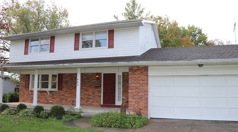 The brick-and-frame house has about 2,200 sq. ft. of living space, plus the full basement. The 4-bedroom home has a 2-car garage, a fenced back yard, a rear wooden deck and a storage barn. CONTRIBUTED PHOTO BY KATHY TYLER