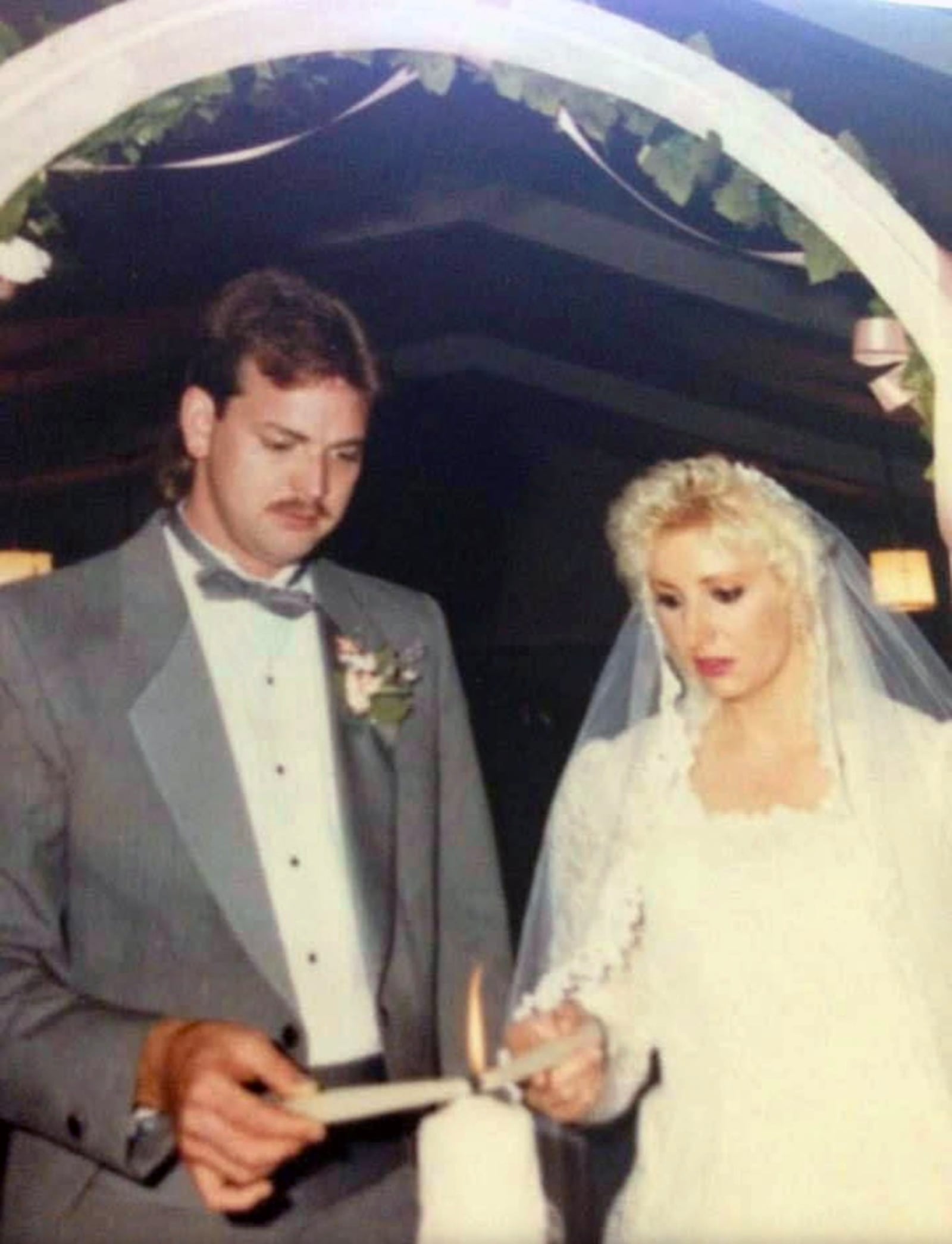 Cindy Davidson (right) and her husband Scott Davidson at their wedding in 1992. She calls him "my savior." CONTRIBUTED