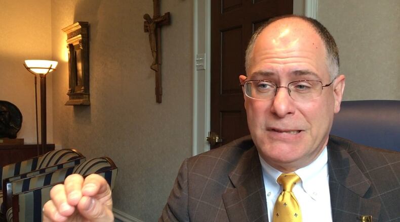 University of Dayton President Eric Spina envisions an innovation hub at the Dayton Arcade would propel business concepts forward in the region.