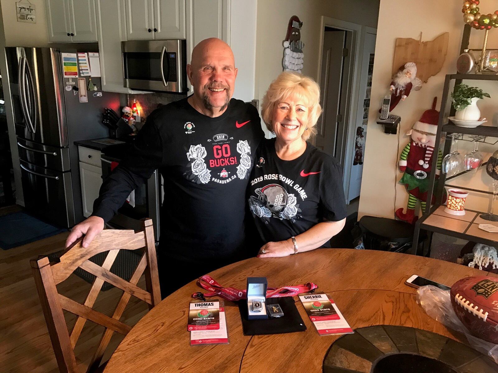 Tom and Sherrie Fischer with Ohio State ring and gold pants (signifying wins over Michigan). Tom Archdeacon/CONTRIBUTED