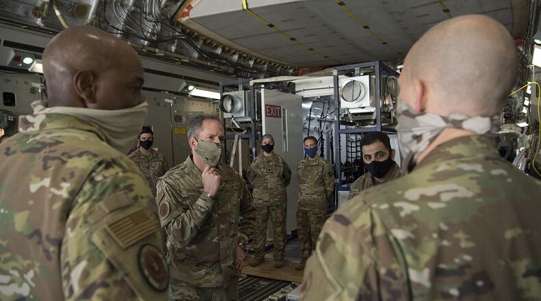 Air Force Chief of Staff Gen. David L. Goldfein listens to a brief by Lt. Col. Paul Hendrickson, Agile Combat Support Directorate’s AF Chemical, Biological, Radiological, and Nuclear Defense Systems Branch materiel leader, about the rapid acquisition process and functional capabilities of a Negatively Pressurized Conex prototype at Joint Base Charleston, S.C., April 30. The NPC was developed and designed to fit inside both C-5 and C-17 aircraft to enable safe transport of up to 28 passengers, as well as teams of medical professionals to medical facilities around the globe. (U.S. Air Force photos/Staff Sgt. Chris Drzazgowski)