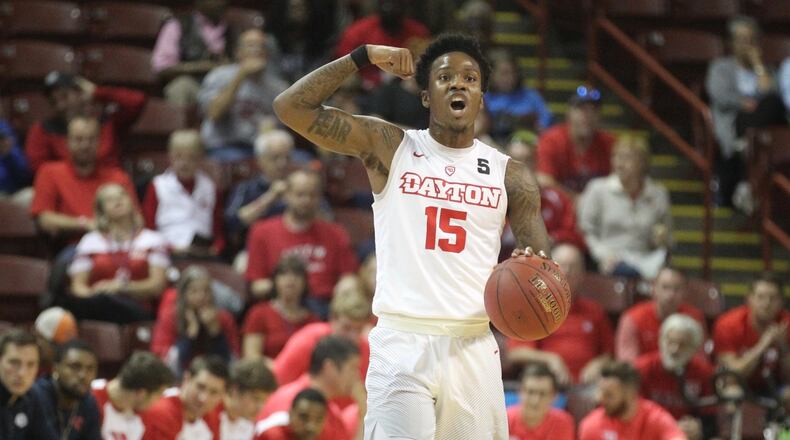 Dayton’s John Crosby brings the ball up the court against Old Dominion on Sunday, Nov. 19, 2017, at TD Arena in Charleston, S.C. David Jablonski/Staff
