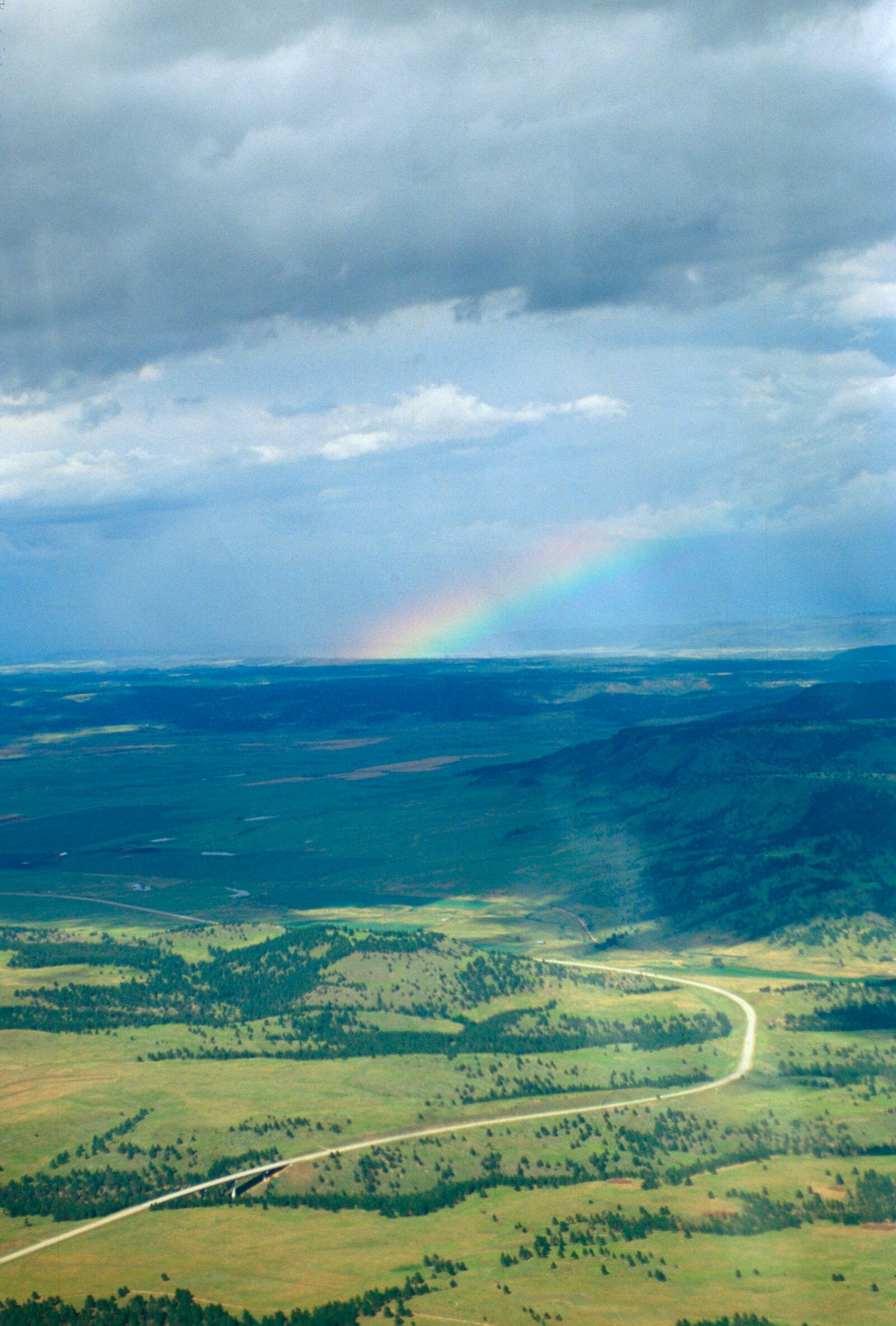 Rain showers and rainbow near Hot Springs, South Dakota - 1997