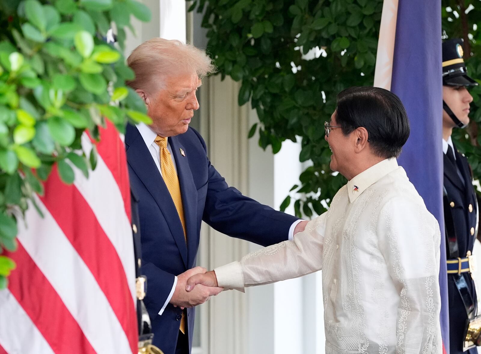 President Donald Trump greets Philippine President Ferdinand Marcos Jr., upon arrival at the White House, Tuesday, July 22, 2025, in Washington. (AP Photo/Alex Brandon)
