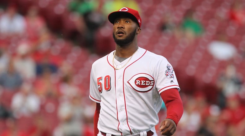 Reds starter Amir Garrett leaves the mound after an out against the Orioles on Wednesday, April 19, 2017, at Great American Ball Park in Cincinnati. David Jablonski/Staff