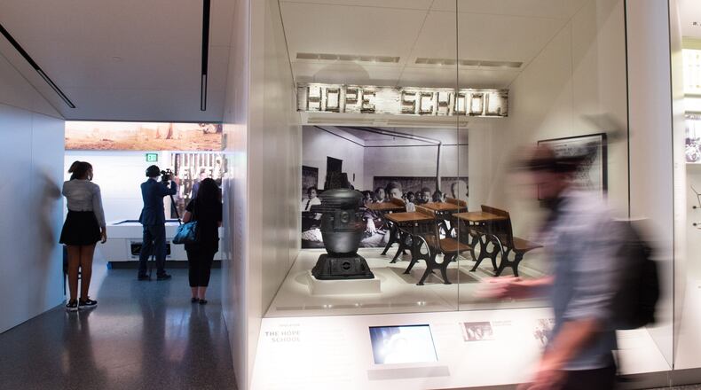 Desks and a wood burning stove from the Hope School are on display at the Smithsonian National Museum of African American History and Culture on Sept. 14, 2016 in Washington, D.C. (Ken Cedeno/McClatchy/TNS)
