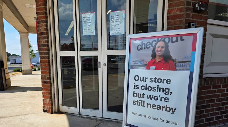 A sign board outside the Franklin CVS at 150 S. Main St. reads "Our store is closing, but we're still nearby." NICK GRAHAM/STAFF