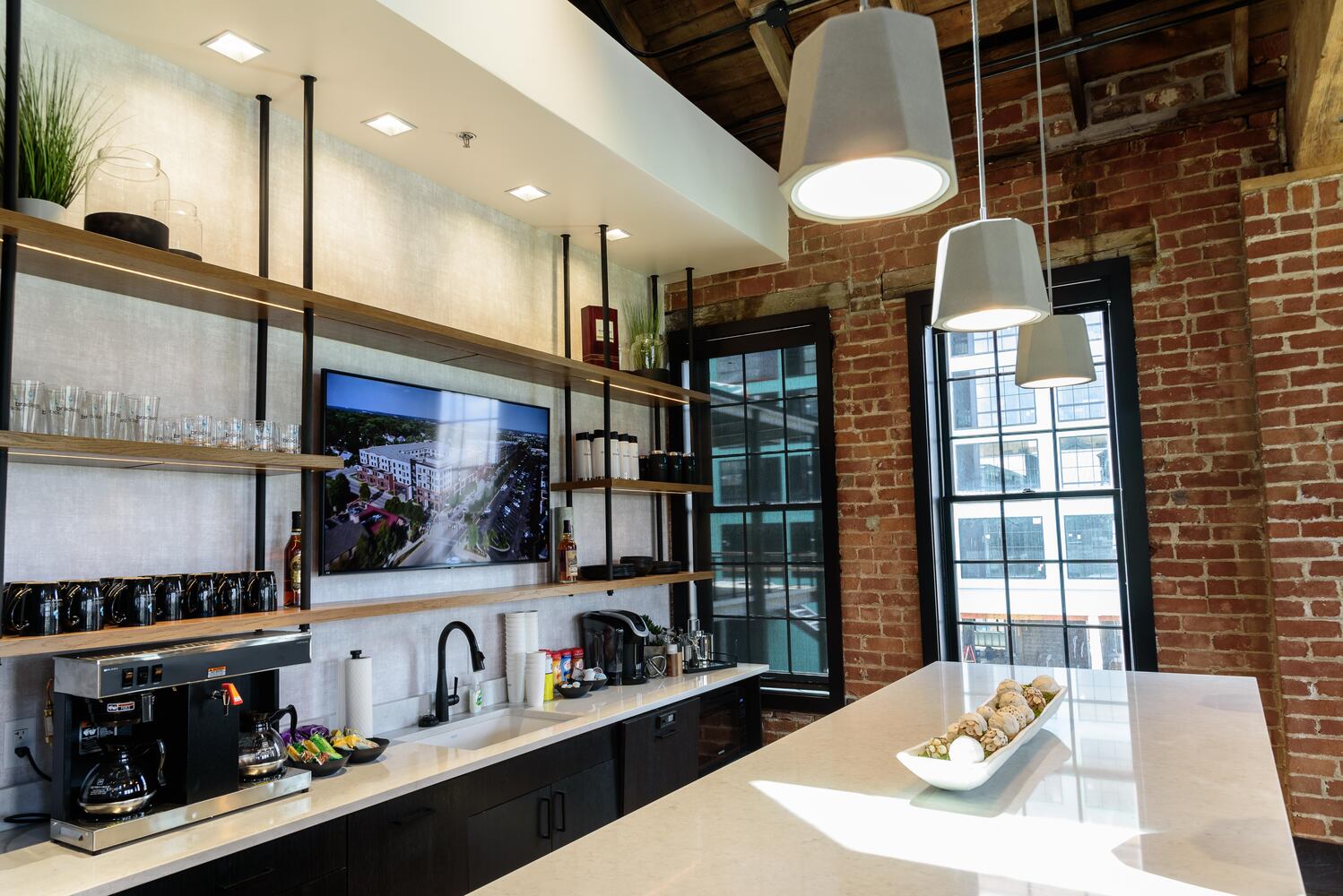 PHOTOS: A look inside the completed Brackett Builders headquarters at Madison on First in downtown Dayton