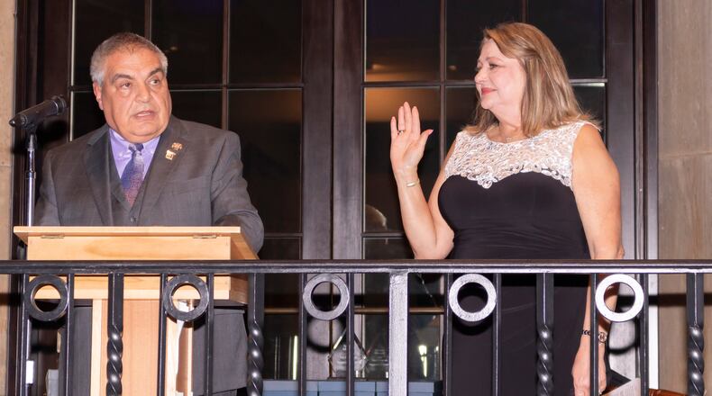 Kelly McCormick is sworn in as 2024 Dayton Realtors President by 2023 Ohio Realtors President Ralph Mantica during the Realtors Installation Reception at the Dayton Art Institute on Thursday, Jan. 11, 2024. CONTRIBUTED