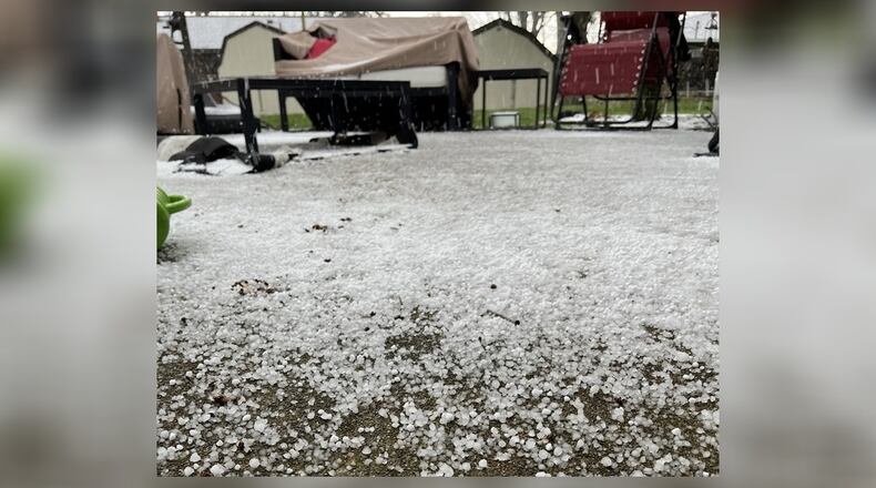 Graupel, or soft hail, fell Friday afternoon in Kettering. DANI SZEMPRUCH / STAFF