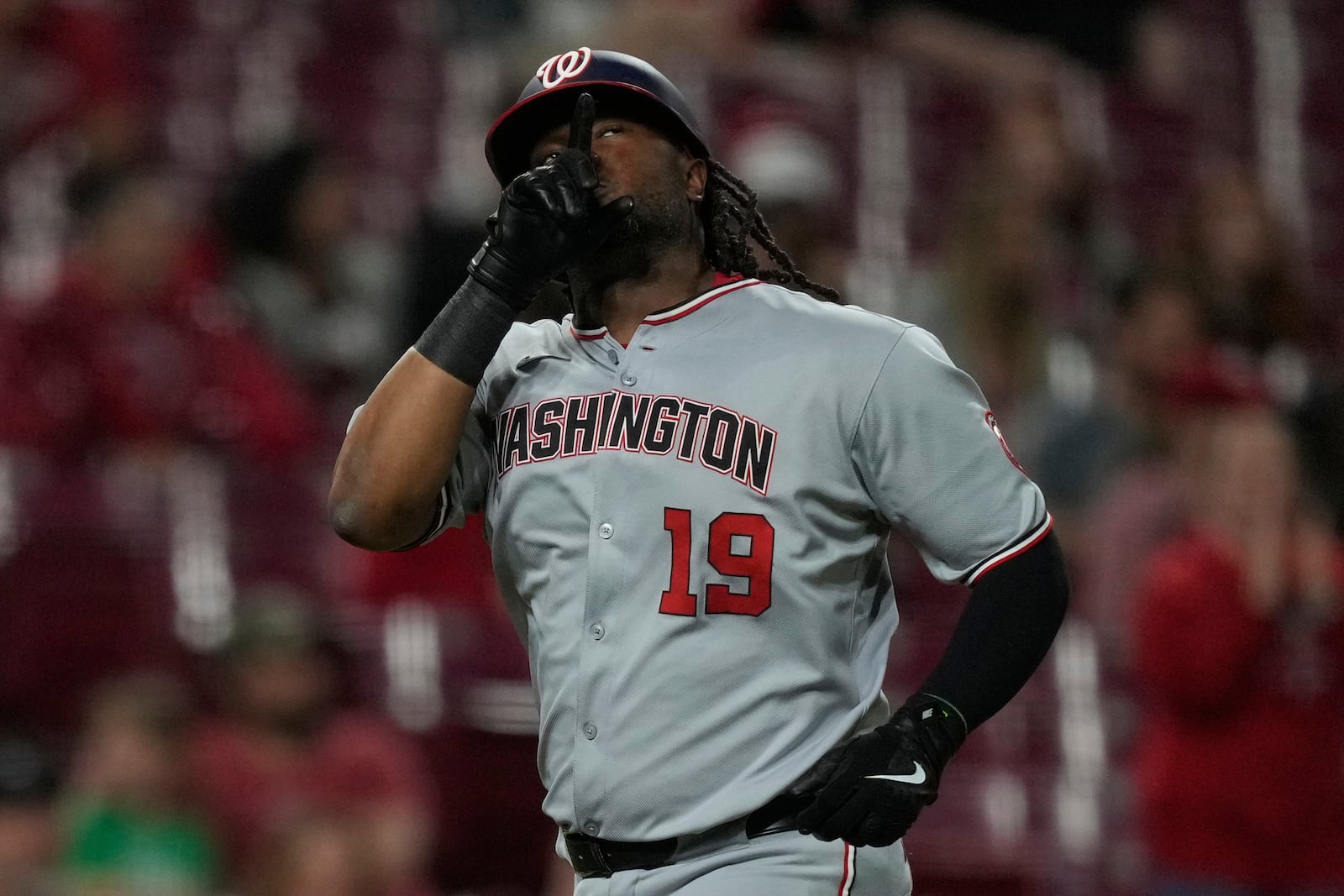 Washington Nationals' Josh Bell gestures as he rounds third base after hitting a solo home run on a line drive to right center field during the fifth inning of a baseball game against the Cincinnati Reds, Friday, May 2, 2025, in Cincinnati. (AP Photo/Carolyn Kaster)