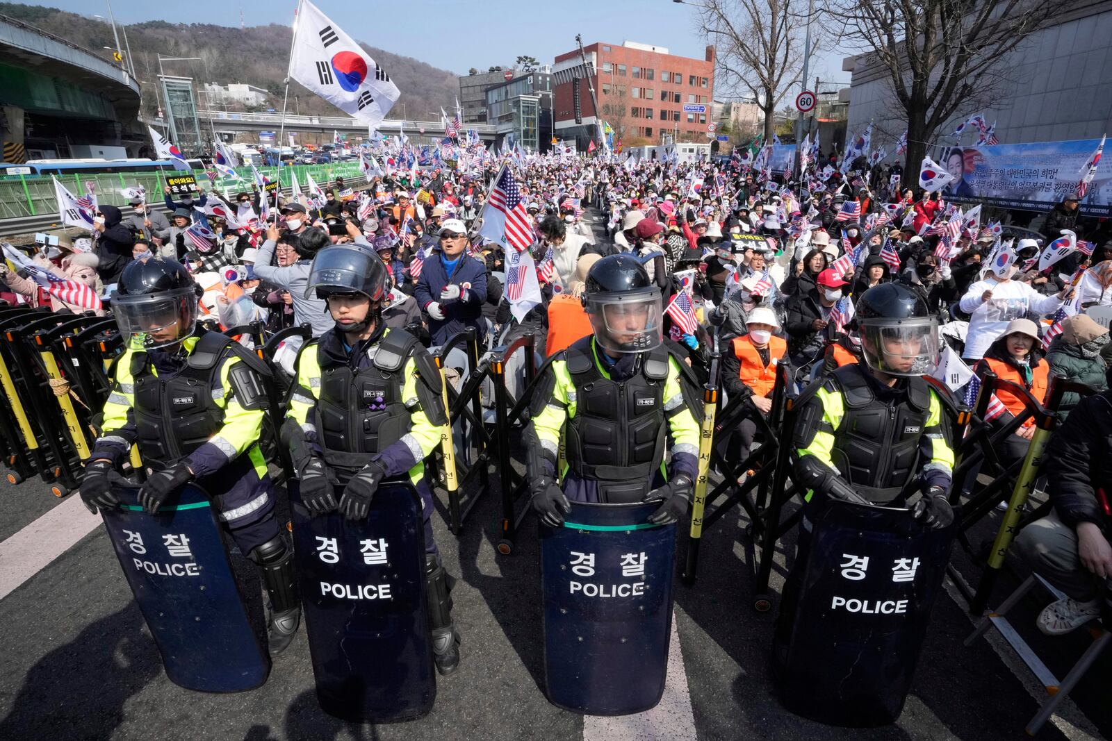 Supporters of impeached South Korean President Yoon Suk Yeol stage a rally to oppose his impeachment near the presidential residence in Seoul, South Korea, Friday, April 4, 2025. (AP Photo/Ahn Young-joon)