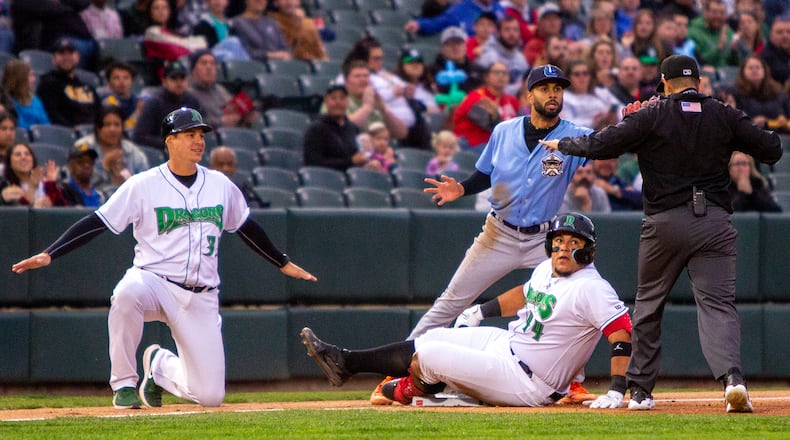 Dayton's Ruben Ibarra is safe on a triple during during the third inning of Thursday night's game against Lake County at Day Air Ballpark. CONTRIBUTED/Jeff Gilbert