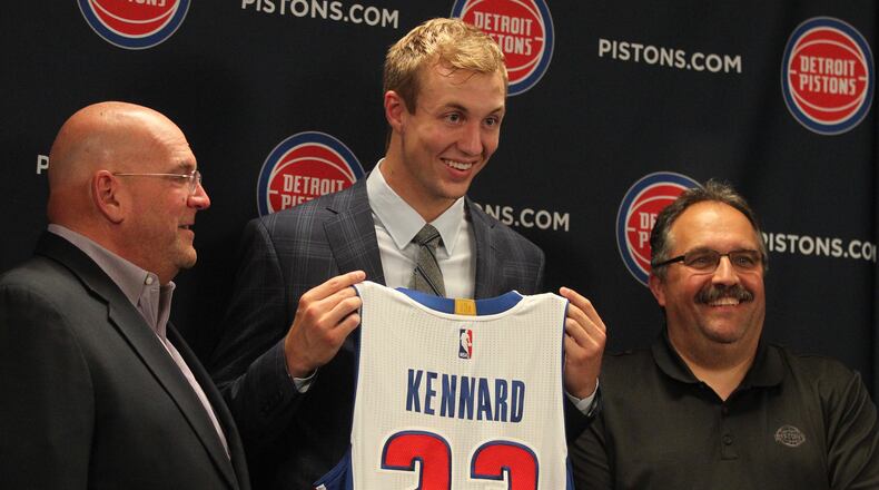 Luke Kennard, center, poses with Pistons General Manager Jeff Bower, left, and head coach Stan Van Gundy on Friday, June 23, 2017, in Detroit.