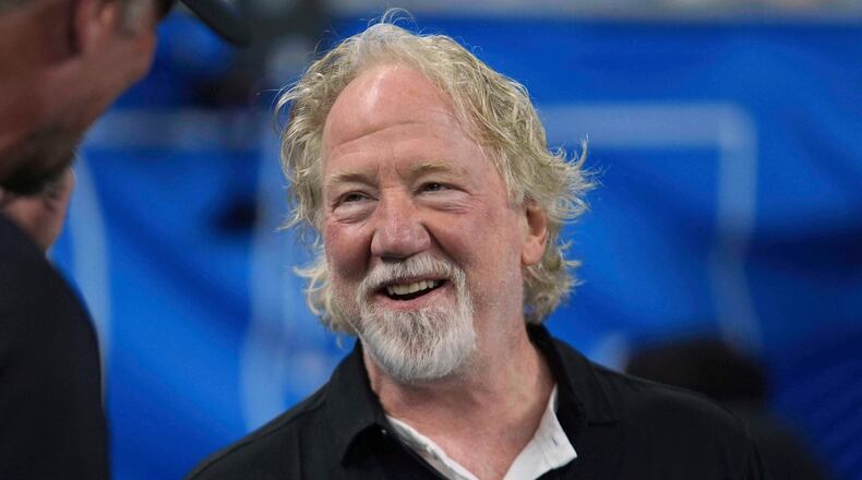 FILE - Actor Timothy Busfield smiles before an NFL football game in Detroit, Sept. 14, 2025. (AP Photo/Paul Sancya, File)