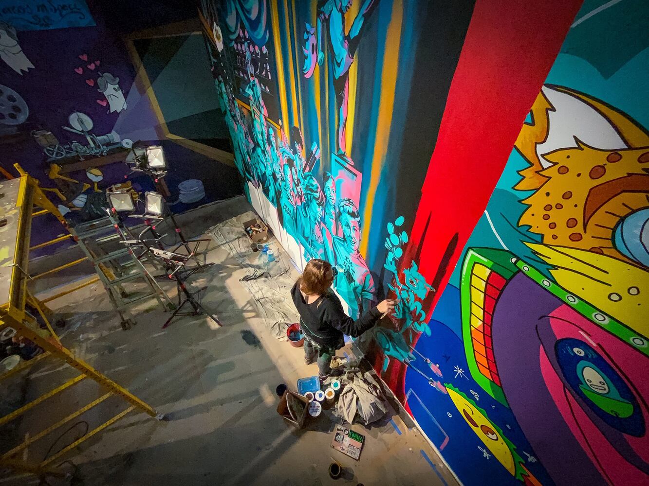 PHOTOS: Wild and wacky murals take over new restaurant at The Greene