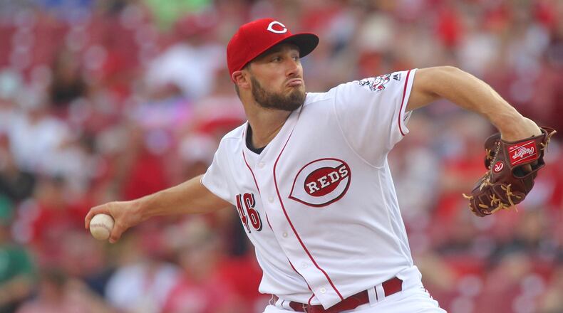 Reds starter Tim Adleman pitches against the Diamondbacks on Wednesday, July 19, 2017, at Great American Ball Park in Cincinnati. David Jablonski/Staff