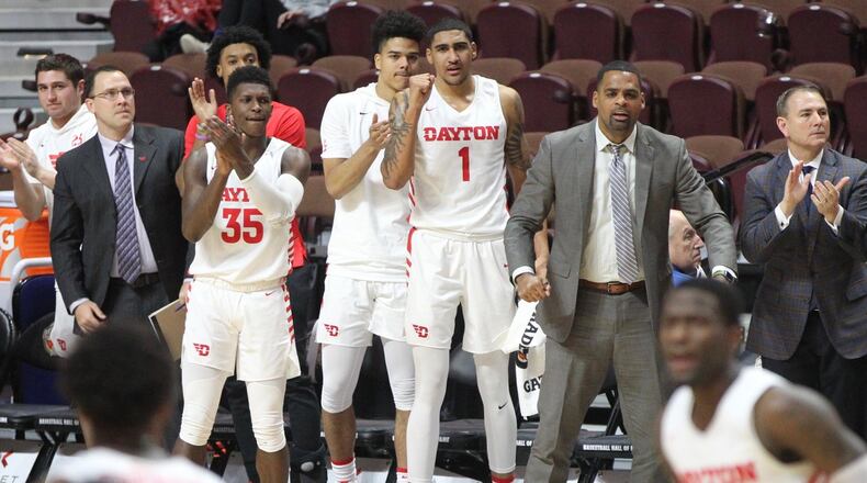 Dayton players cheer after a score against Tulsa on Sunday, Dec. 16, 2018, at Mohegan Sun Arena in Uncasville, Conn. David Jablonski/Staff