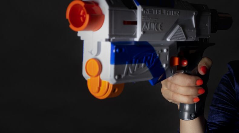 Police are warning high schoolers and locals alike to beware of people who may be playing "Nerf wars", a foam-dart game seniors launch on their own, apart from the schools. Some are trespassing or could be in danger if people don't recognize their mission. Students playing often have dart-shooting toys like the one in this photo. FILE/CANVA