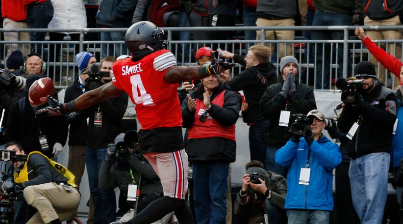 Ohio State running back Curtis Samuel celebrates his touchdown against Michigan during the second overtime of an NCAA college football game Saturday, Nov. 26, 2016, in Columbus, Ohio. Ohio State beat Michigan 30-27 in double overtime. (AP Photo/Jay LaPrete)