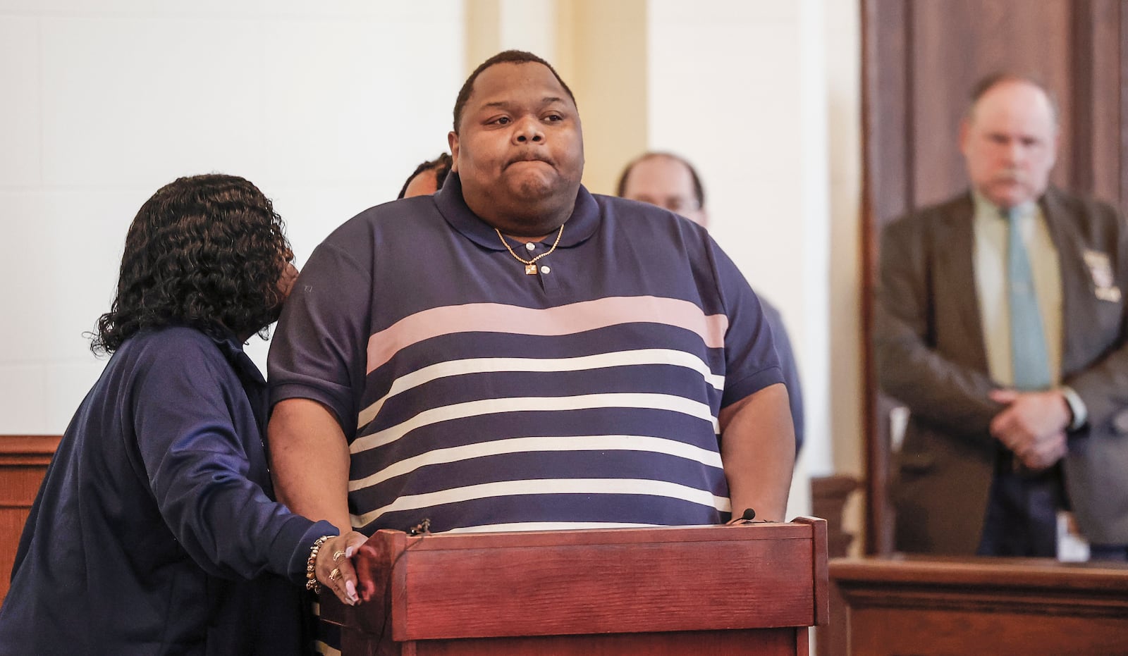 Mario Hall, the son of Lo-Letha "Letha" Toland-Hall prepares to speak during the sentencing of William Brock at the Clark County Common Pleas Court on Friday, Jan. 30, 2026, in Springfield. The hearing was continued to Monday after Brock's attorney, Jon Paul Rion, collapsed in the courtroom. JOSEPH COOKE / STAFF