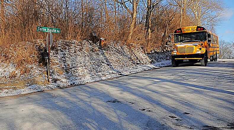 A trash truck rear-ended a Northwestern Local Schools bus Friday morning at the intersection of Snyder Domer, Terre Haute and Thackery roads. No one was reportedly injured. STAFF PHOTO / MARSHALL GORBY