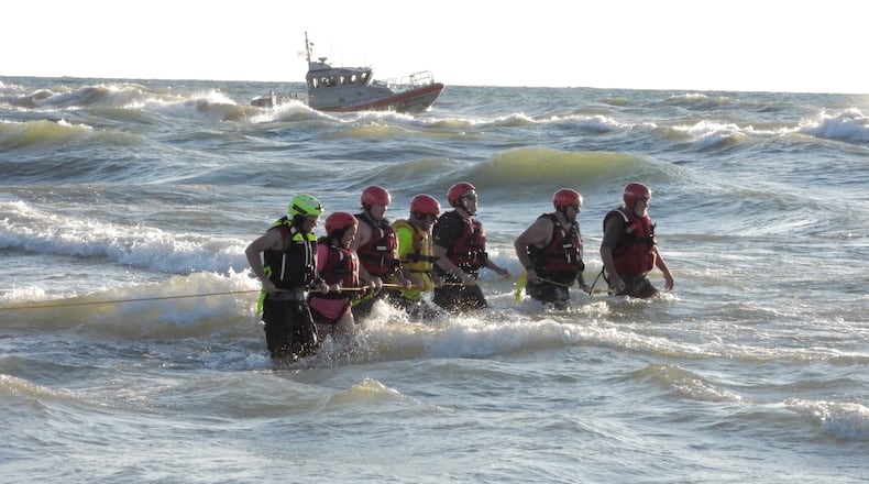 Crews searched Lake Michigan Wednesday, June 13, 2022, after a Beavercreek man and Texas boy went missing and were presumed drowned.