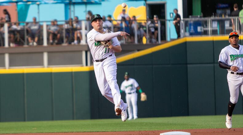 Dragons second baseman Sal Stewart fires to first for an out in the first inning Thursday night at Day Air Ballpark against West Michigan. Jeff Gilbert/CONTRIBUTED