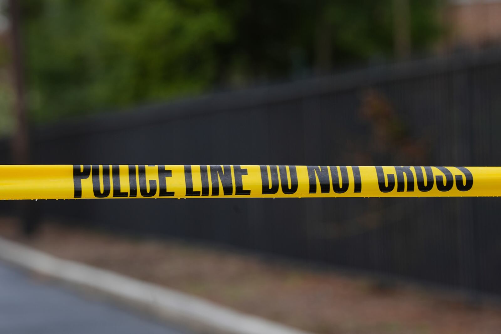 Police tape cordons off an area outside Pennsylvania governor's official residence in Harrisburg, Pa., Monday, April 14, 2025. (AP Photo/Matt Rourke)