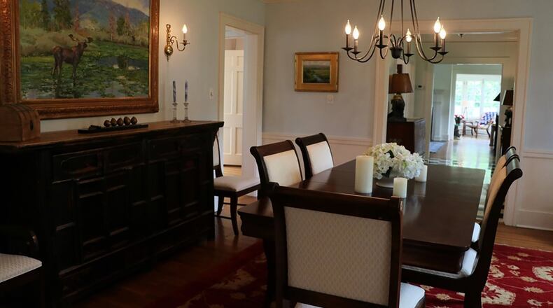 A chandelier centers the formal dining room.