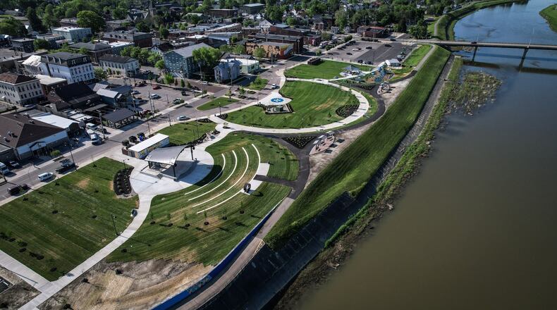 Miamisburg's Riverfront Park is a $5.5 million revamp featuring a 7,600-square-foot playground and an amphitheater. A grand opening celebration for the 7.5-acre park is scheduled for Friday, May 10. JIM NOELKER/STAFF
