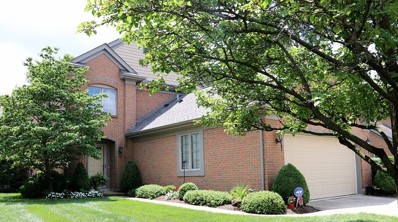 This condominium, with about 2,460 sq. ft. of living space, has a first-floor bedroom with private bathroom and 2 additional bedrooms off the upstairs loft. The kitchen has updated granite countertops and a bay bump-out breakfast room. CONTRIBUTED PHOTOS BY KATHY TYLER